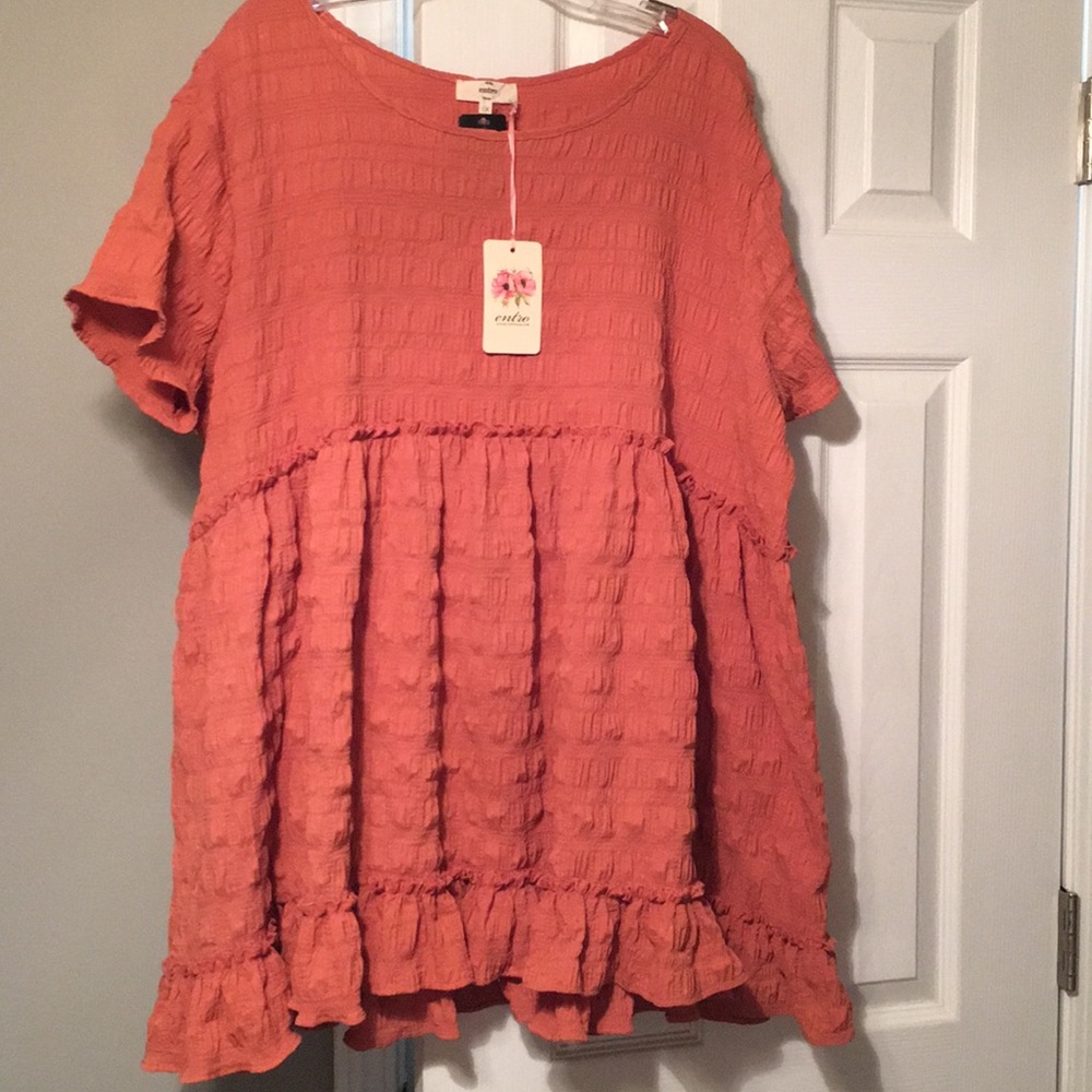 Entro textured peplum coral top